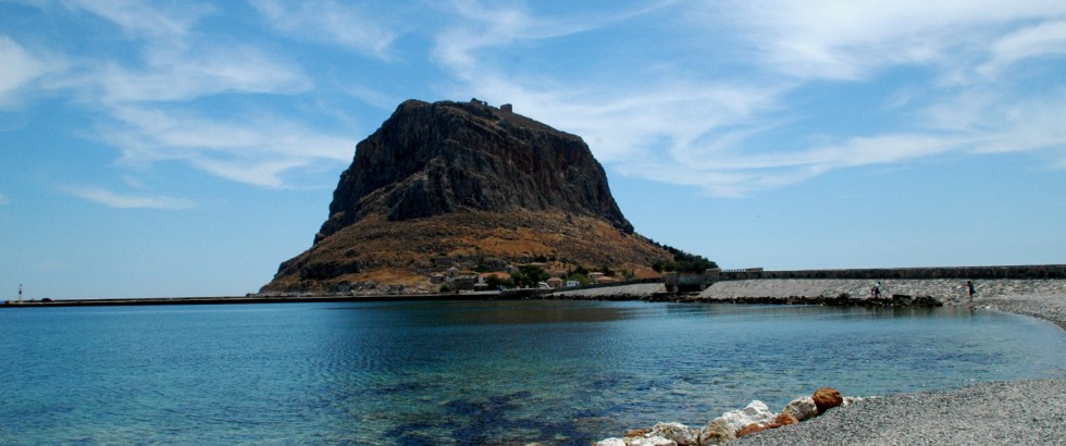 <h1>The Rock</h1><h3>Monemvasia means single entrance, and as you cross the narrow bridge linking the fortified rock to the mainland, you can see why.</h3>